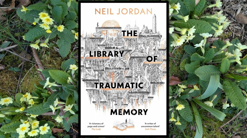Front cover of The Library of Traumatic Memory by Neil Jordan over the top of some yellow primroses.